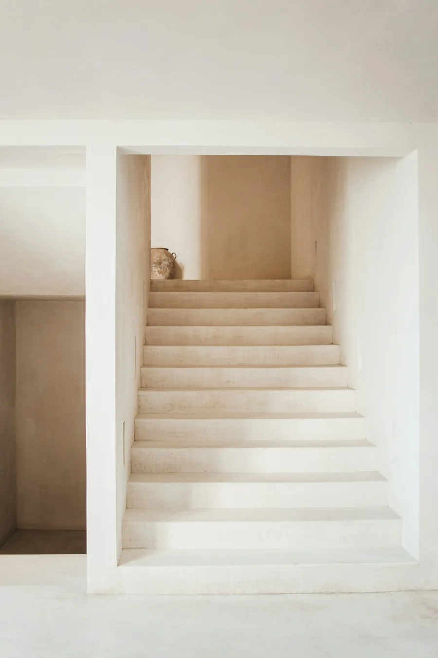 A quiet staircase in warm daylight