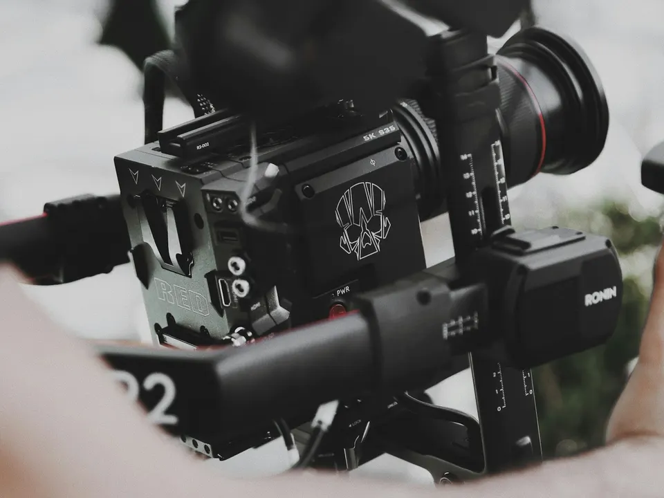A photographer working with a studio camera